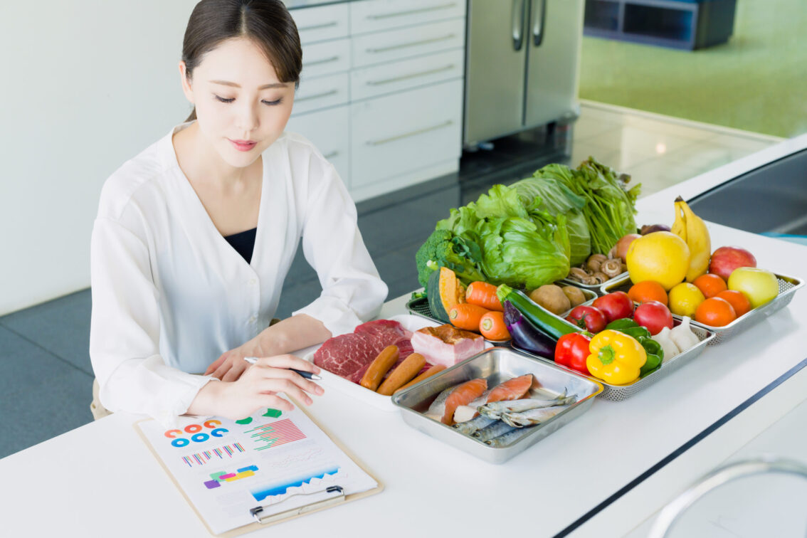 Young,Woman,And,Foodstuff.,Food,Coordinator.,Nutritionist.